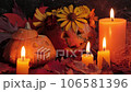 Halloween concept, composition of pumpkins and candles on a black background, Jack's lantern from pumpkin 106581396