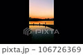 Fishermen in the city limits. Fishing in the middle of the city in the golden rays of sunset 106726369