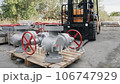 Details pipeline forklift lifts on a wooden pallet 106747929
