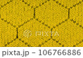 Close-up of yellow texture fabric cloth, textile background. Movement from left to right.  106766886