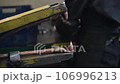 Welder makes metal products using contactless welding machine. Production of metal products 106996213