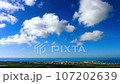 blue sky and flowing white clouds 107202639