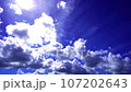 blue sky and flowing white clouds 107202643