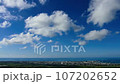 blue sky and flowing white clouds 107202652