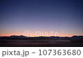 Flowing morning mist and dawn scene 107363680