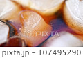 Ice Cubes in Coke Soda Drink 107495290