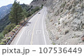 4K Aerial Pursuit of Convertible Car in Angeles Crest Mountains 107536449