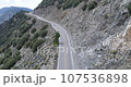 4K Drone Captures Convertible's Scenic Mountain Drive in California 107536898
