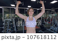 Woman is exercising in the gym. 107618112