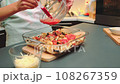 Baked vegetables with cheese pour tomato puree 108267359