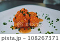 Baked cauliflower topped with green onions 108267371