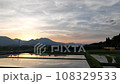 Scenery with the evening sky reflected in the mirror and the Sangi Railway 108329533