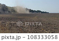 Farmer plows the land in a field in the countryside. Autumn tillage. 108333058