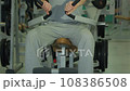 Man doing exercise for the chest muscles 108386508
