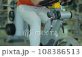 Exercise for the legs on a stationary bike 108386513