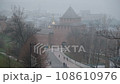 Ivanovskaya tower of the Nizhny Novgorod Kremlin in the thick November fog 108610976