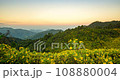 Light from the sun and shadows from the clouds across the mountain range At Bua Tong Field, Doi Mae Ukho, Mae Hong Son, Thailand 108880004