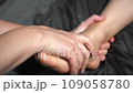 Professional foot massage. Authentic footage of luxury spa treatment. Charming light. Shallow depth of field. Stylized and colored. 109058780