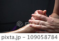 Professional foot massage. Authentic footage of luxury spa treatment. Charming light. Shallow depth of field. Stylized and colored. 109058784
