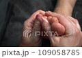 Professional foot massage. Authentic footage of luxury spa treatment. Charming light. Shallow depth of field. Stylized and colored. 109058785