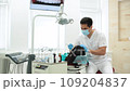 Cute young girl is being examined by the dentist 109204837