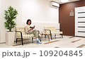 Cute young girl is being examined by the dentist 109204845