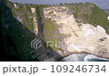 Dramatic aerial drone footage of the famous Kelingking Beach and cliffs in Nusa Penida in Bali, Indonesia 109246734
