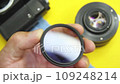 Cleaning of photographic equipment. Cleaning dust and dirt from the camera lens and sensor. 109248214