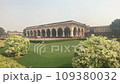 Agra, India, November 2019 - A large building with a grassy field 109380032