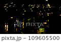 Cars are driving fast on the night road in the rain. Time lapse. Cars headlights and night city lights are reflected on the wet road. Beautiful view cars driving on the highway. 4k Video footage for n 109605500