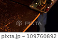 Jigsaw cuts a board. Slow motion. Electric jigsaw cuts a wooden slab. A piece of furniture is cut with a saw in a carpentry workshop. Furniture in factory. Carpenter works with wood. Professional tool 109760892