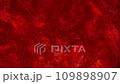 Abstract waxy slow motion of gold particles in red liquid. Floating golden dust glitters in red fluid motion. Sparkling galaxy of moving sequins. 109898907