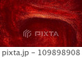 Atmospheric whirlwind movement of gold particles in red fluid. Countless glittering sparkling particles in red fluid motion. Abstract Blazing moving background with gold dust particles.  109898908