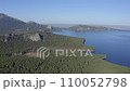 Aerial drone footage of rock remnant near the Lake Great Chebachye Lake in Natonal park Burabay Borovoe , Kazakhstan 110052798