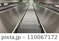 escalator downstairs moving down 110067172
