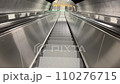 Empty working escalator downstairs moving down 110276715