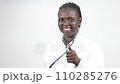 young woman doctor standing with stethoscope smiling to make a thumb sign young woman doctor standing with stethoscope smiling to make a thumb sign 110285276