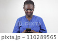 portrait of young woman with mobile phone, smiling. portrait of young woman with mobile phone, smiling. 110289565
