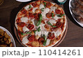 Margherita pizza on a wooden tray 110414261