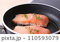 Pan-fried Salmon. Cooking salmon in a pan. 110593079