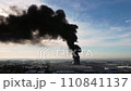 Aerial view of major fire in industry of Cavenago di Brianza, near Milan, Italy. Arson in Italian town near A4 freeway. Toxic clouds of black smoke in sky 110841137