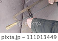 The intruder saws through the lock shackle with a metal hacksaw 111013449