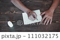 Man crosses out written phrase and taking pills. Top view close up 111032175
