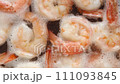 Boiled white shrimp peeled in boiling water in a pan 111093845