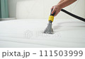The concept of cleaning and housekeeping. Dry cleaning of the mattress by a professional method 111503999