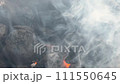 Smoldering Charcoal with Fire Flames in Outdoor Grill. 111550645