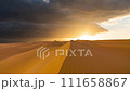 Timelapse of sunset over the sand dunes in the desert. Sahara desert 111658867