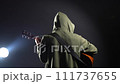 Musician playing acoustic guitar on black background 111737655