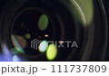 Security camera lens zooming in, close up. Private property protection and public surveillance concept. 111737809