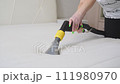 Mattress dry cleaning. Dry cleaning at home. Close-up. Dry cleaning of the mattress at home. 111980970